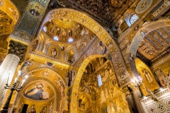 Saracen arches and Byzantine mosaics within Palatine Chapel of the Royal Palace in Palermo, Sicily, Italy